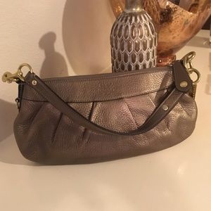 Gold coach evening bag